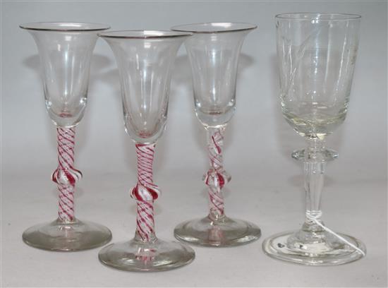 Three Dutch 18th century style knopped pink and white opaque twist wine glasses and another wine glass (4) tallest 17.5cm